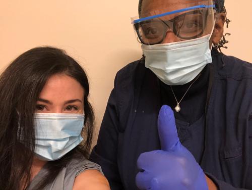 Dr. Rachel Evers-Meltzer, Dermatology resident and health informatics consultant

"My turn! I’m so grateful to have received my first dose of the Pfizer vaccine today 
@The_BMC
. Thanks especially to the lovely and brave Nurse Gwenny! "