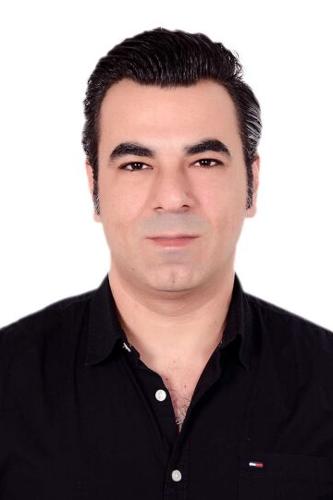 Headshot of Mulham Allujami, DDS, oral and maxillofacial surgeon at Boston Medical Center