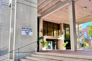 Photo showing the exterior/entrance of the Solomon Carter Fuller Mental Health Center, a modern brutalist edifice on East Newton Street in Boston&rsquo;s South End